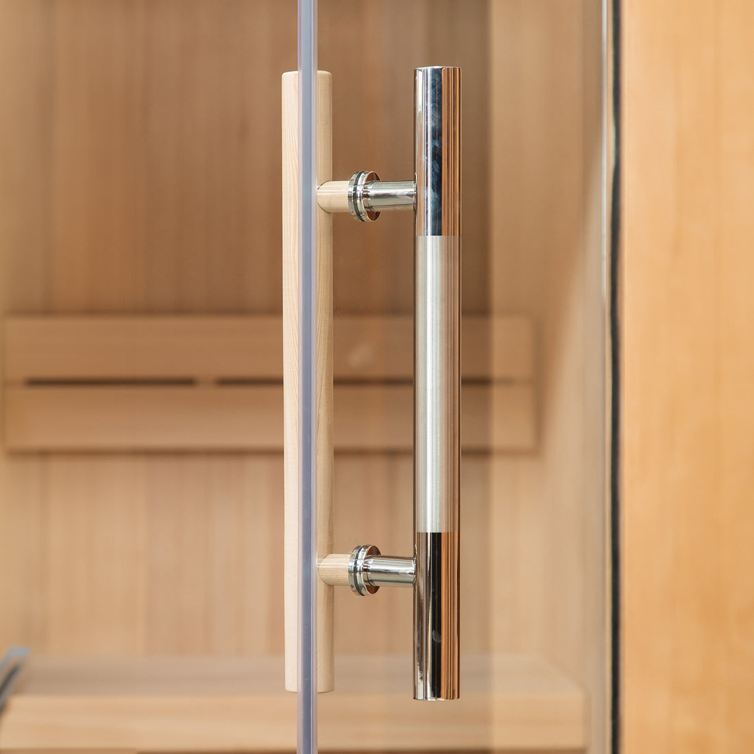 Tarve 3 Person Canadian Hemlock Sauna with Harvia Stove featuring a wooden interior and visible metal pole, suggesting sturdy construction. Smoke from the window indicates the stove's active heating function.