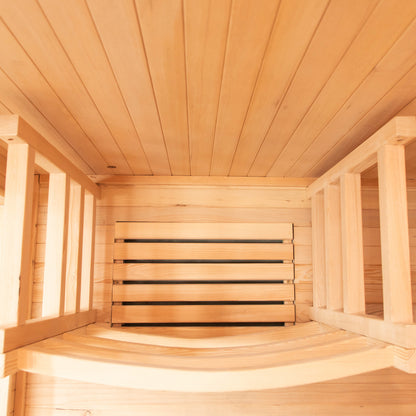 Tarve 3 Person Canadian Hemlock Sauna with Harvia Stove, showcasing close-up wood panels and surface details, highlighting its robust hardwood construction suitable for indoor installation.