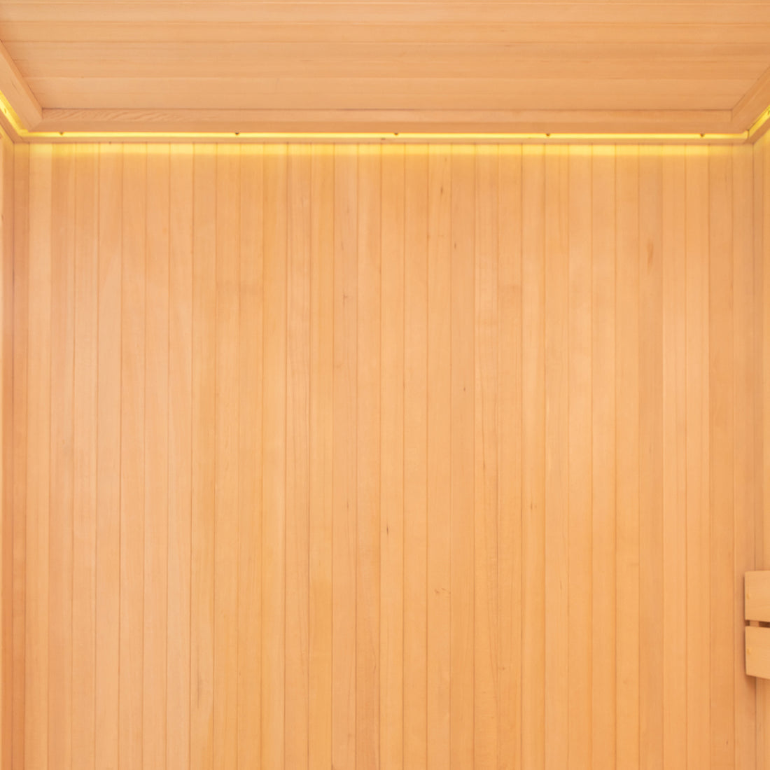 The Tarve 3 Person Canadian Hemlock Sauna with Harvia Stove features a sleek indoor design with smooth hardwood surfaces highlighted by a light strip, showcasing exquisite craftsmanship and varnished plywood elements.