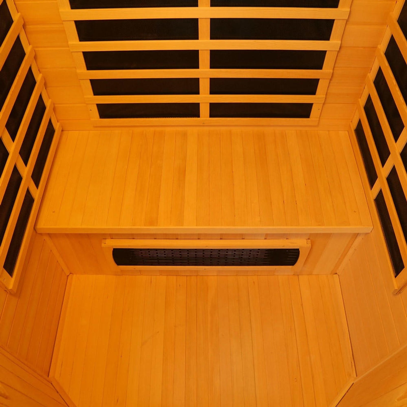 Tukeva 2 Person Carbon Fibre Infrared Sauna – Hemlock features close-up views of its sleek wood surface, vent, and window, highlighting its modern design and craftsmanship for home wellness.