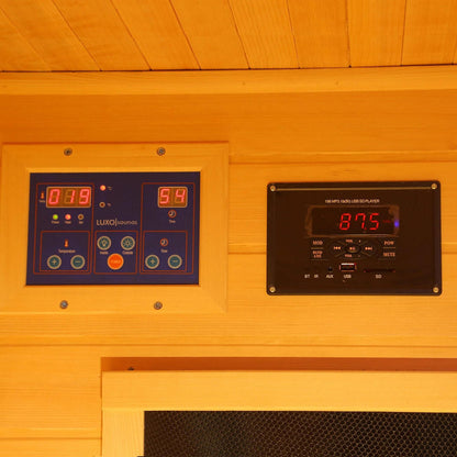 Tukeva 2 Person Carbon Fibre Infrared Sauna – Hemlock, showcasing a digital control panel with red numbers and a sleek, portable design, ideal for home wellness with advanced infrared technology.