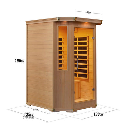 Close-up of the Tukeva 2 Person Carbon Fibre Infrared Sauna – Hemlock, showcasing its tempered glass door and wooden design, ideal for home wellness with modern features and easy relocation.