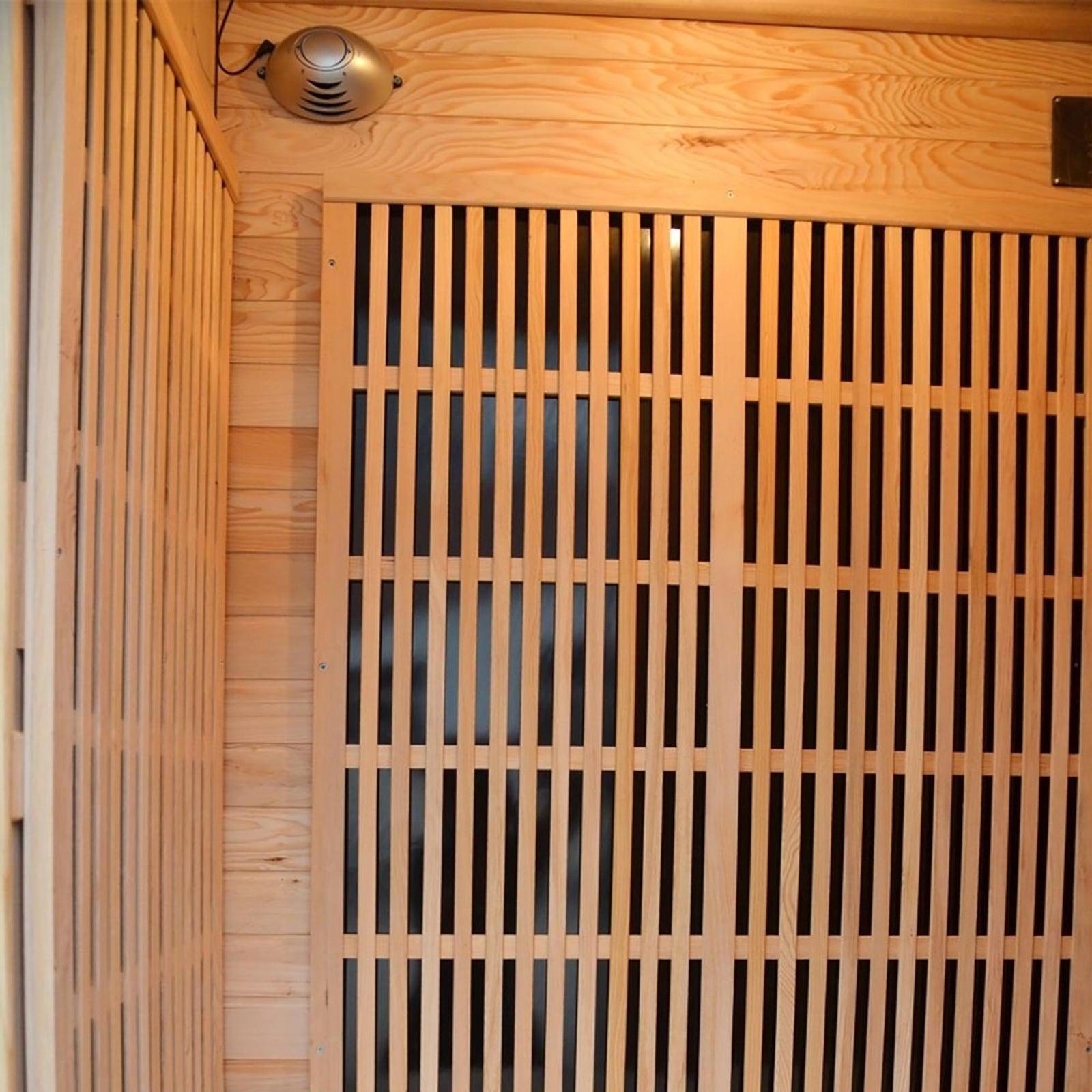 Tumma 2-Person Carbon Fibre Infrared Home Sauna featuring close-ups of its Canadian hemlock wood panels and construction, emphasizing precision craftsmanship, ideal for enhancing relaxation and well-being.