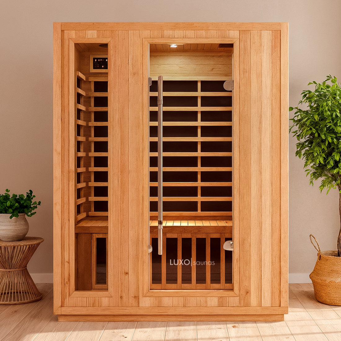 Valo 3 Person Carbon Fibre Infrared Indoor Sauna with vertical cedar paneling, full-height glass door, slatted benches, and woven towel basket, offering a luxurious in-home relaxation experience.