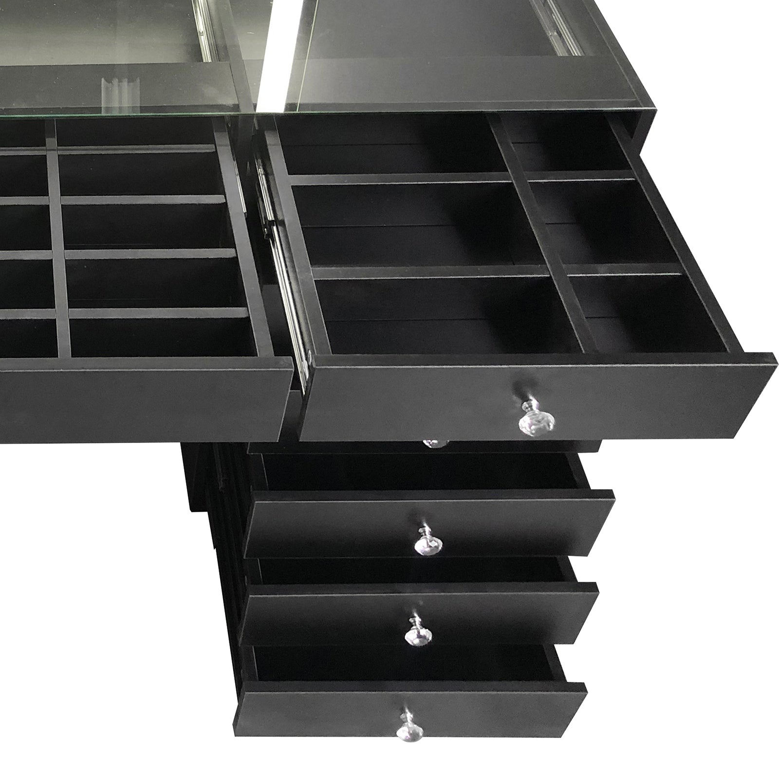 Adeline Makeup Vanity Table with LED Mirror in Black features a top glass lid, two shallow drawers with small compartments, and four deeper drawers with crystal-style knobs, all empty.
