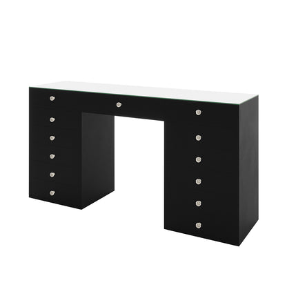 Adeline Glass Top Storage Makeup Dressing Table Desk in Black features a sleek glass surface, supported by pedestal bases with 13 crystal-knobbed drawers, offering stylish storage for beauty essentials.