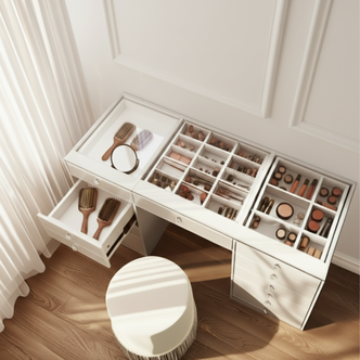Adeline Glass Top Dressing Table in White featuring organized compartments with makeup items, a round upholstered stool, and a sleek glass display top showcasing cosmetics, enhancing any beauty space with style and functionality.
