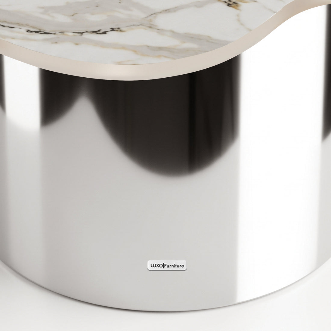 Close-up of a luxury table with a reflective metallic base and marble-like top on a white background