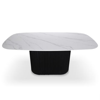 Aeris 180cm Marble Look Dining Table With Wood Base in Black features a white marble-look top with grey veining and a fluted black pedestal base, offering modern elegance and practicality.