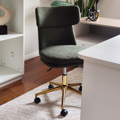 Luxo Aerona High Back Boucle Office Chair in Dark Green features textured upholstery, a curved backrest, polished gold base, and black caster wheels, set in a modern home-office environment.