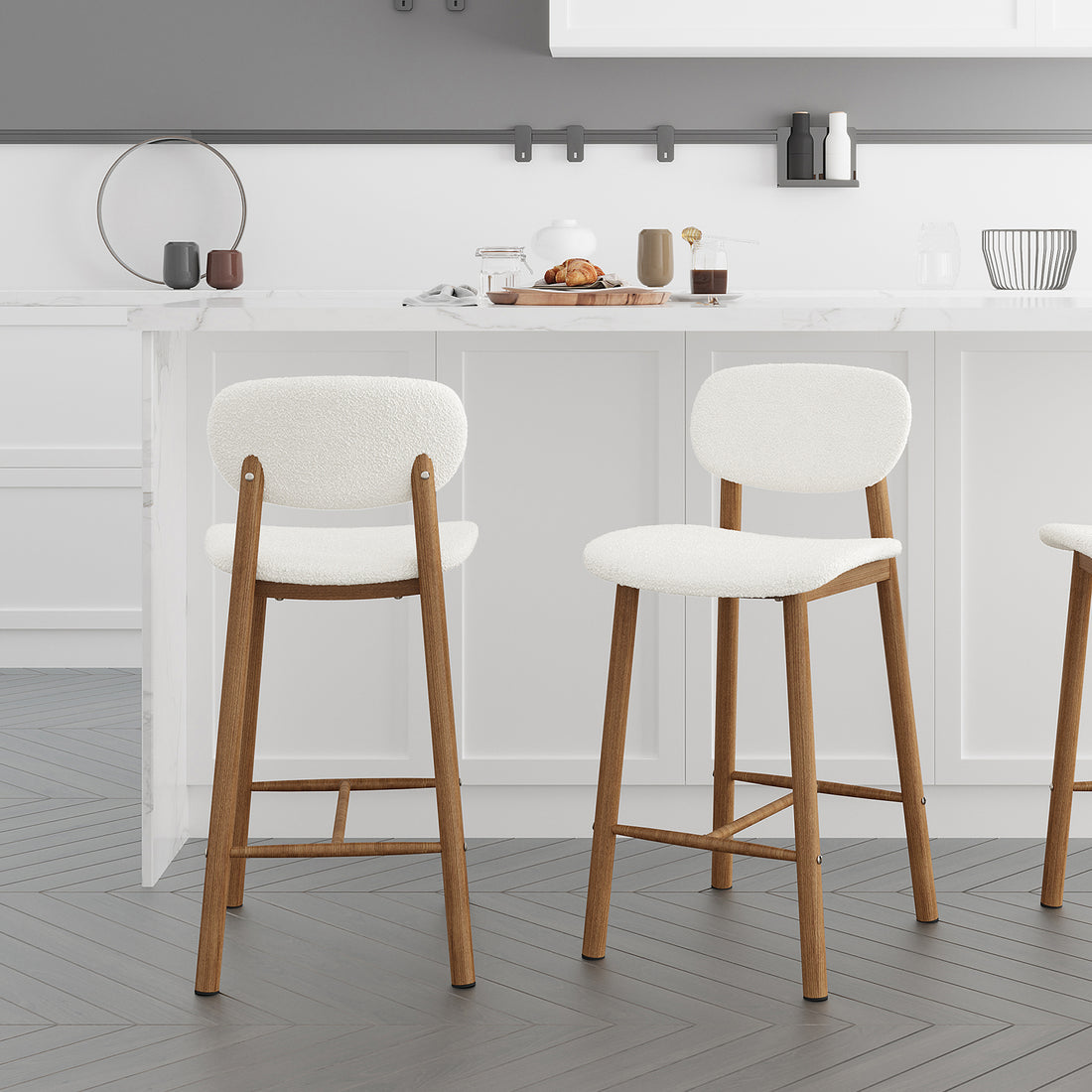 Afrim Boucle Upholstered High-Back Bar Stool Set of 2 features plush boucle upholstery, high backrest, and metal legs, shown near a counter with two chairs for a modern indoor setting.