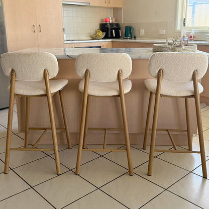 Afrim Boucle High Back Bar Stool Set of 2 in Cream White at a light-wood kitchen island, featuring plush upholstery, high backrest, and metal legs, blending with the modern kitchen décor.