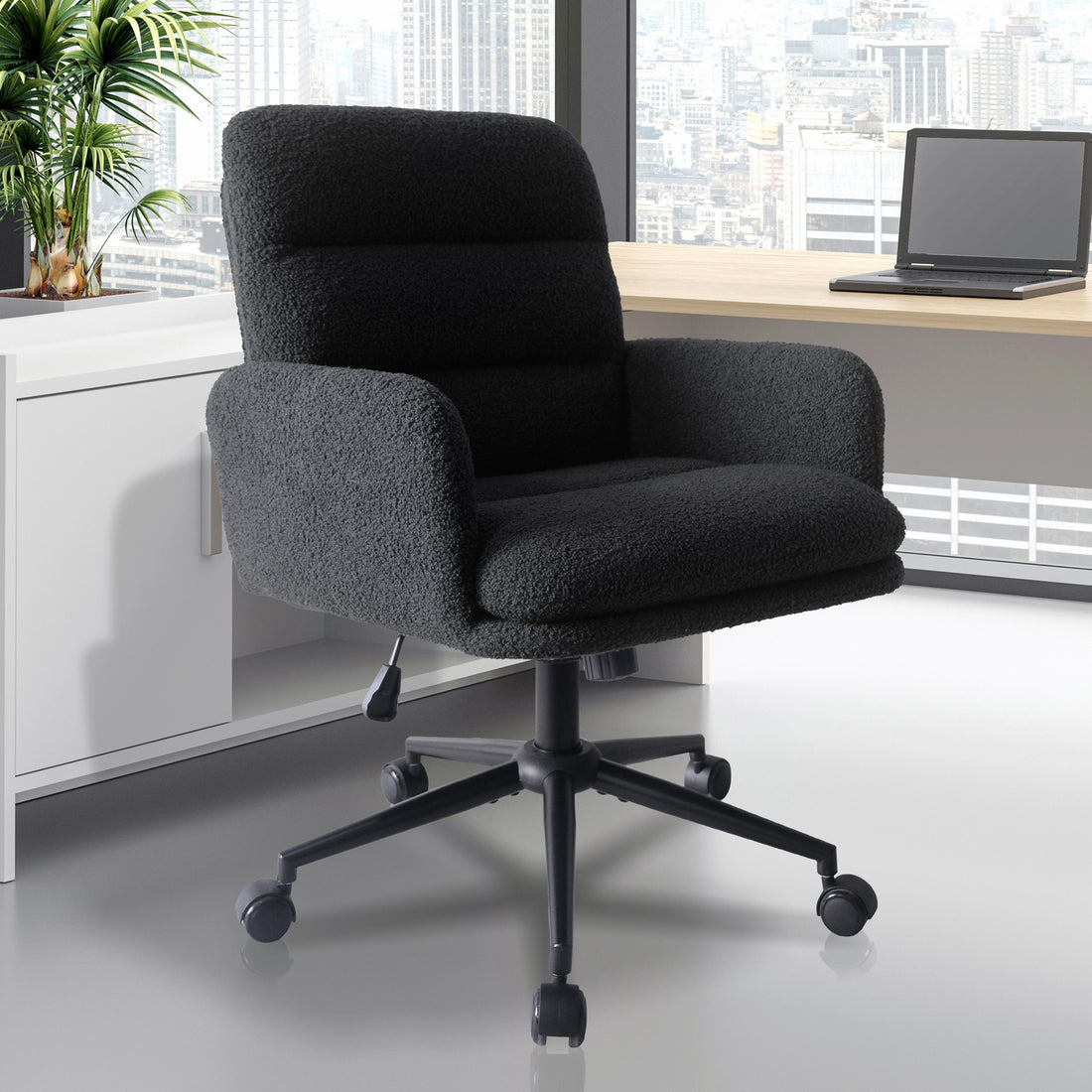 Luxo Aglaya Boucle Swivel Office Chair in Black, featuring plush boucle upholstery, padded armrests, contoured seat, and five-star metal base with caster wheels, ideal for modern office settings.