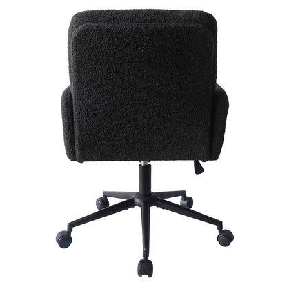 Luxo Aglaya Boucle Swivel Office Chair in Black, showcasing its plush boucle fabric, ergonomic backrest, short armrests, pneumatic height-adjustment lever, and sturdy five-spoke metal base with caster wheels.