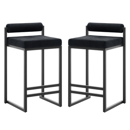 Aivy Velvet Bar Stool Black Set of 2 showcasing sleek design with velvet upholstered seats and matte black metal frames. The stools are ideal for contemporary dining spaces, emphasizing modern comfort and functionality.