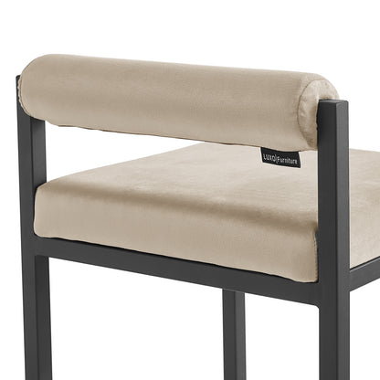 Close-up of the Aivy Velvet Bar Stool - Set of 2, showcasing the plush foam padding and sleek black metal frame with a built-in footrest, embodying modern design and comfort.