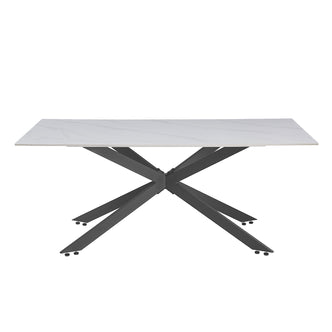 Alfred 180cm Modern Pedestal Dining Table - White Marble features a sleek white marble-look top with a spider-like black metal base, ideal for seating six, blending modernity and elegance.