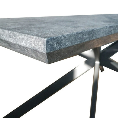 Alfred 180cm 6 Seater Pedestal Dining Table in Concrete features a thick, gray stone-like tabletop with black metal cross-brace legs, showcasing a modern and artistic design.