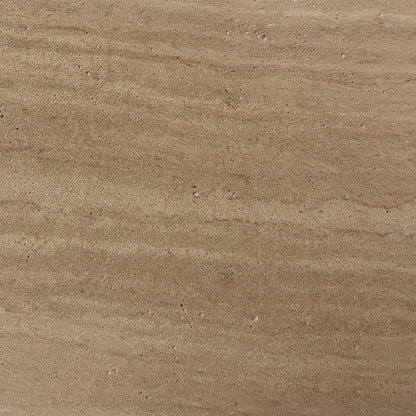 Close-up of Amarosa Curved Indoor/Outdoor Concrete Coffee Table Beige, showcasing its unique porous surface texture, resembling natural stone or wood grain, reflecting its robust and modern design for versatile indoor or outdoor use.