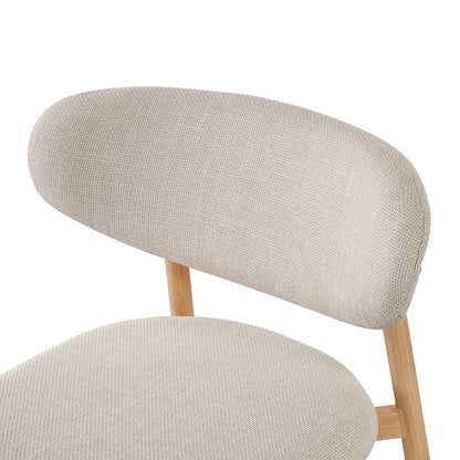 Audrey Curved Linen Barstool Set of 2 in Beige, featuring light-wood frame, beige woven upholstery on seat and backrest, ergonomic design, and sturdy metal legs with a wood-look finish.