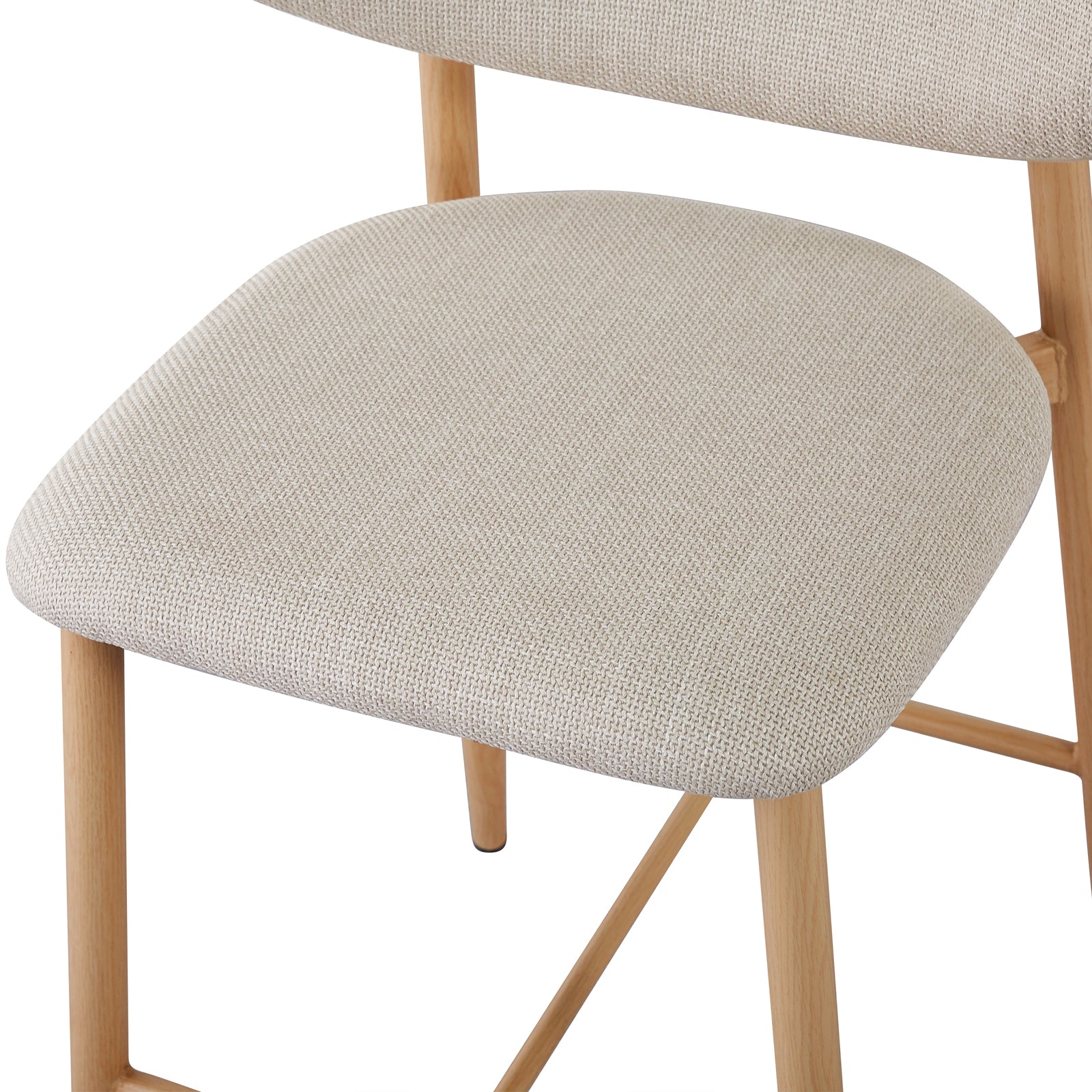 Audrey Curved Linen Barstool Set of 2 in Beige features a close-up of a beige upholstered seat on a light-stained wooden frame, showcasing its modern, minimalist design.