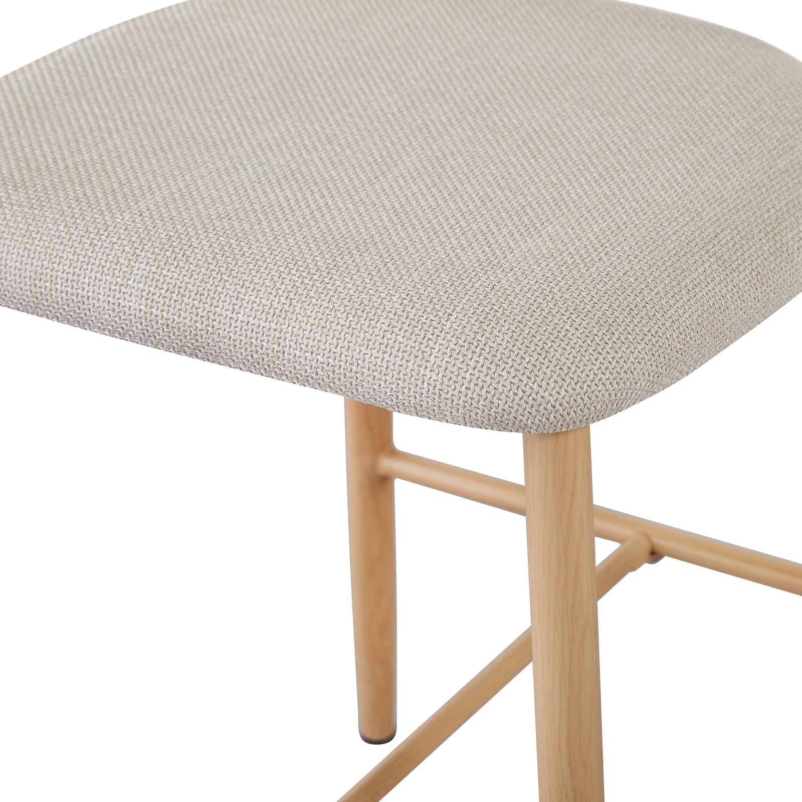 Audrey Curved Linen Barstool Set of 2 in Beige features a light-beige, upholstered seat with slender, light-wood legs and cross-bracing bars, combining elegance and comfort for modern kitchens or bars.
