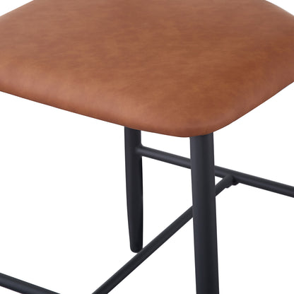 Audrey Curved PU Leather Barstool Set of 2 in Tan features a rounded brown upholstered seat on a black metal frame with cross-bars, offering stylish design and comfortable seating.