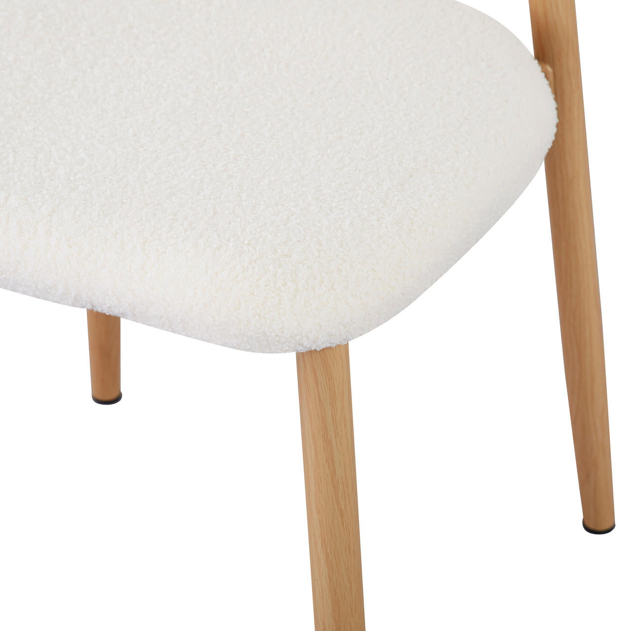 Close-up of Audrey Curved Fabric Dining Chair Set of 2 in Cream White, showcasing the off-white boucle-upholstered seat and simple round wooden legs, highlighting the chair's elegant and modern design.