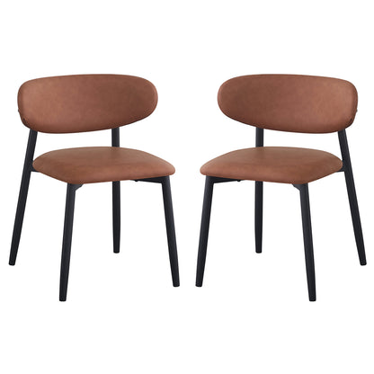 Audrey Curved Leather Dining Chair Set of 2 in Tan, featuring oval backrests, padded seats in warm faux leather, and slender matte black legs, showcasing a modern, elegant design.