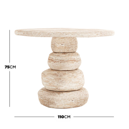 Azalea Round Indoor/Outdoor Concrete Dining Table Travertine with a circular top, sculptural pebble-like base of four stacked irregular stones, finished in a travertine style. Dimensions: 75 cm tall, 110 cm wide.