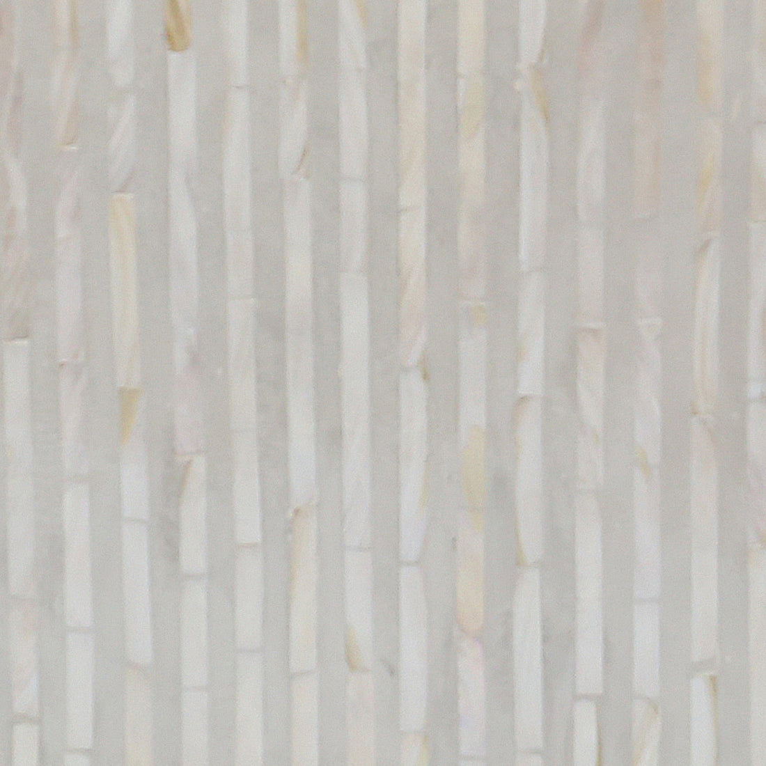 Baltoy 100cm Mother of Pearl Inlay Coffee Table in Sand, showcasing a close-up of its textured surface with white/cream elongated rectangular mosaic tiles set in vertical columns.