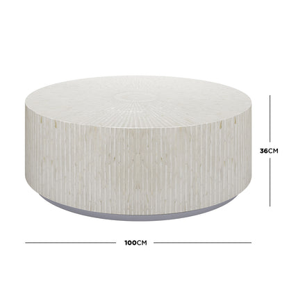 Baltoy 100cm Mother of Pearl Inlay Coffee Table in Sand, featuring a low, cylindrical design with a sunburst pattern on top and linear strips around the sides.
