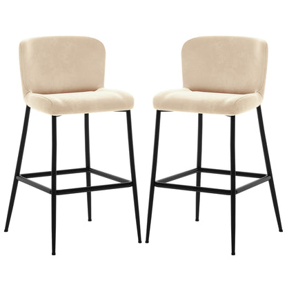 The Bernie High Back Velvet Bar Stool Set of 2 in Oatmeal features beige upholstered seats with low backrests, supported by matte-black metal legs and integrated footrests, offering modern elegance and comfort.