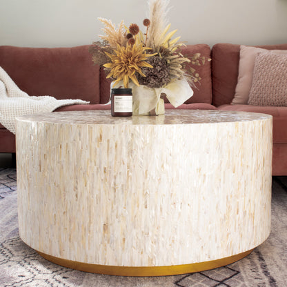 Close-up of Bisera 91cm Mother of Pearl Inlay Coffee Table Cream, showcasing intricate mosaic of hand-crafted mother-of-pearl tiles on the tabletop, highlighting its luxurious design and artisanal craftsmanship.