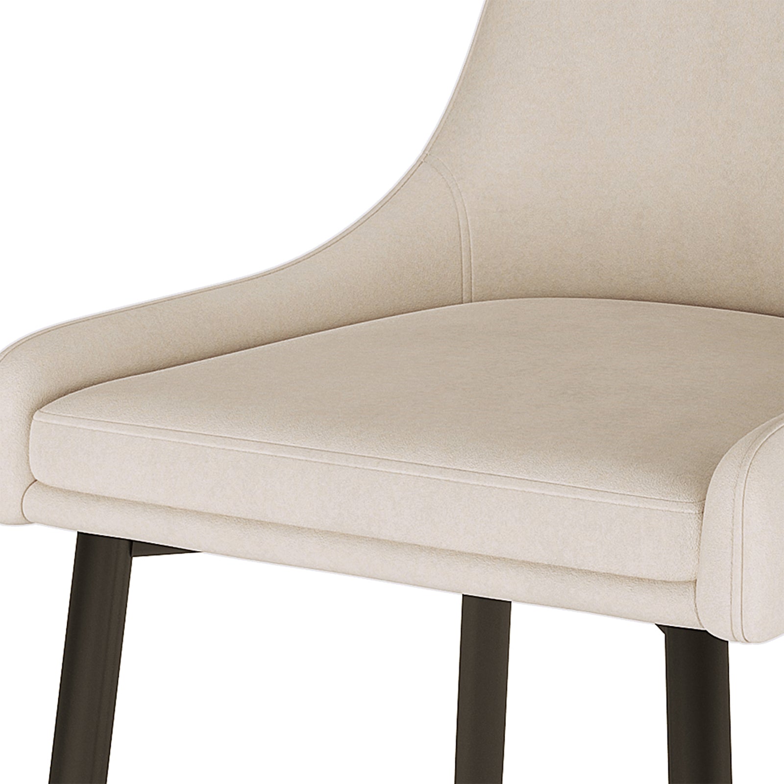 Blythe Velvet Dining Chair Set of 2 in Beige features a close-up of the padded seat, low armrest, and backrest, supported by slim, dark metal legs, showcasing modern elegance and comfort.