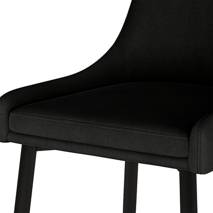 Blythe High Back Fabric Dining Chair Set of 2 in Black, showcasing a close-up of the modern, upholstered seat and curved armrests, supported by slim legs, highlighting its minimalist and sleek design.