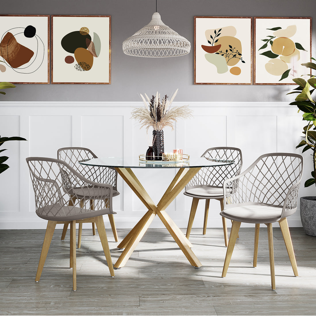 Caesar Beech Dining Chair Set of 4 in Grey, featuring open-lattice backs and wooden legs, surrounds a glass-top table with decor. Elegant dining setup with modern accents and botanical prints.