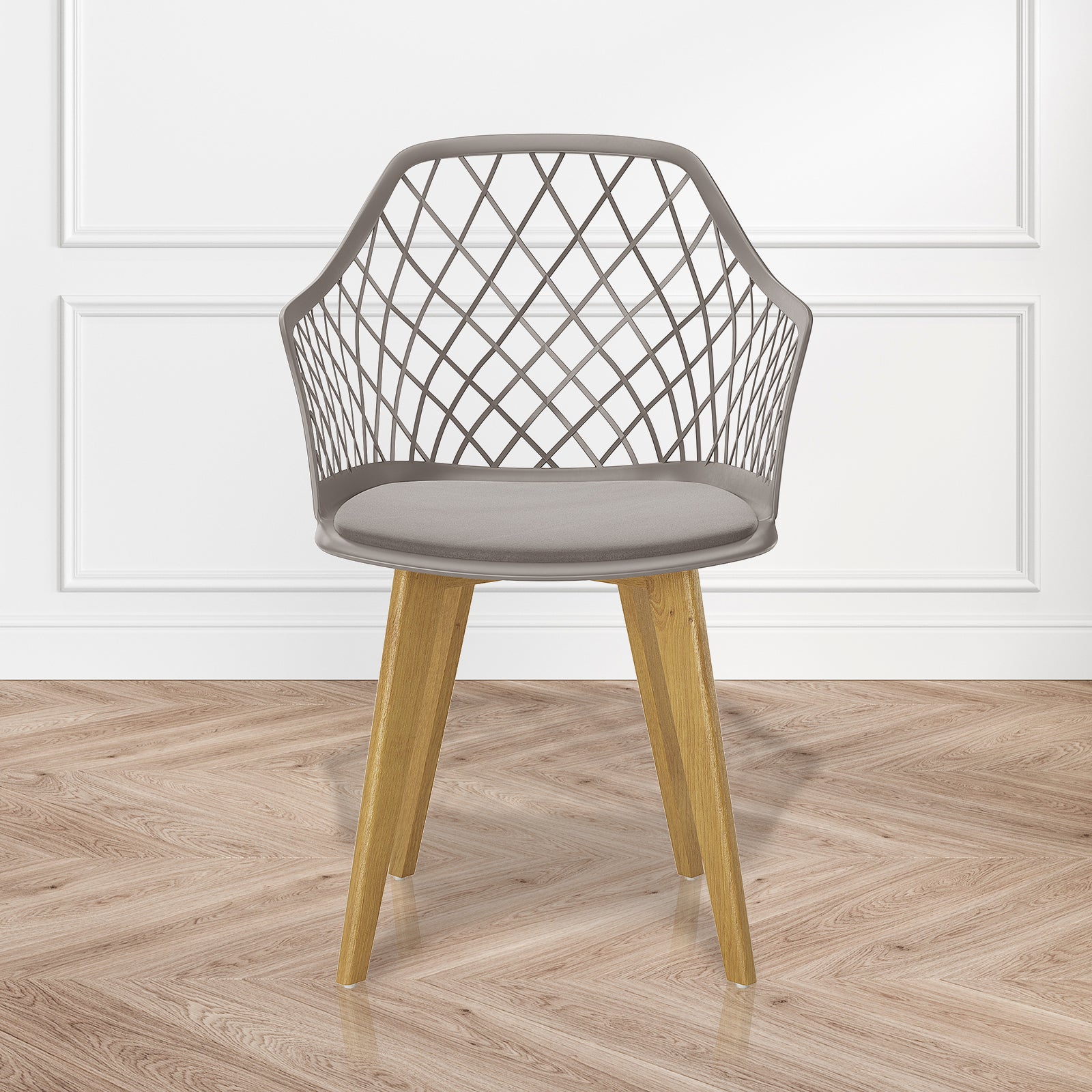 Caesar Beech Dining Chair Set of 4 in Grey, featuring a modern design with a crisscrossing open-lattice backrest, natural wood legs, and a slim cushion, on a herringbone wood floor.