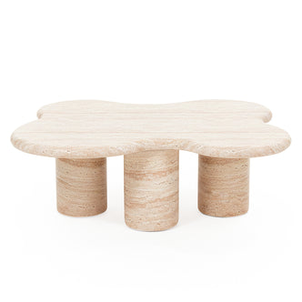 Sculptural beige stone coffee table on pure white background