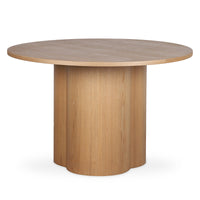 Cece 120cm Round Wooden Dining Table in Oak featuring a smooth, circular tabletop and solid cylindrical pedestal base, showcasing minimalist design with light natural wood and modern simplicity.