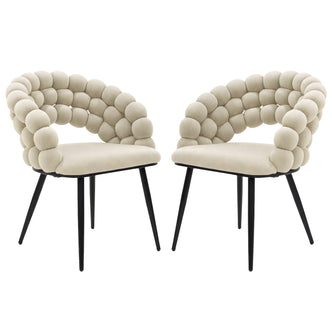 Claudine Velvet Curved Dining Chair Set of 2 in Oatmeal features a black metal base, lightly padded beige seat, and a distinctive rolled bubble backrest with rounded cushioned segments.