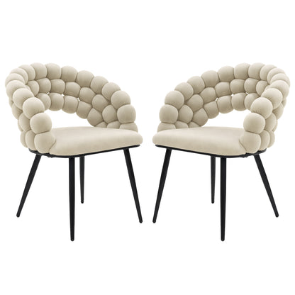 Claudine Velvet Curved Dining Chair Set of 2 in Oatmeal features a black metal base, lightly padded beige seat, and a distinctive rolled bubble backrest with rounded cushioned segments.