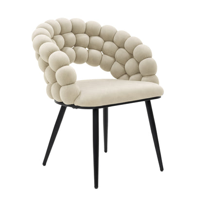 Claudine Velvet Curved Dining Chair Set of 2 in Oatmeal features a low, rounded seat with a pillowy, wrap-around backrest and sleek black metal legs, embodying modern elegance and comfort.