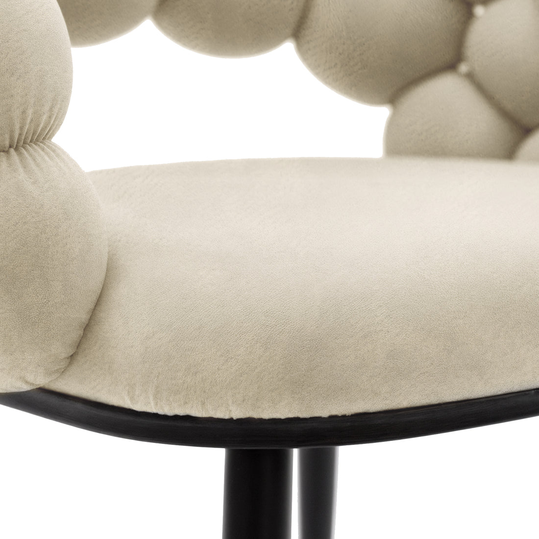 Claudine Velvet Curved Dining Chair Set of 2 in Oatmeal featuring a plush, bead-like padded backrest and pale beige fabric cushion, supported by a sleek black metal frame and legs.