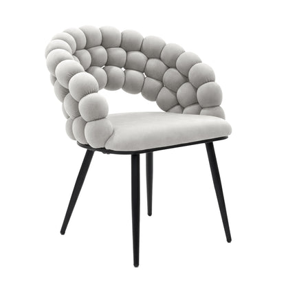 Claudine Velvet Curved Dining Chair Set of 2 in Warm Grey features bubble-style upholstered backrest and armrests, smooth seat cushion, and matte black tapered legs, blending contemporary design with comfort.