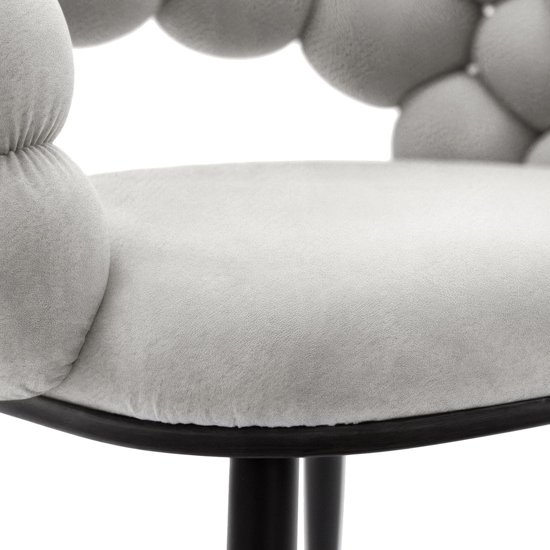 Claudine Velvet Curved Dining Chair Set of 2 in Warm Grey features a smooth light-grey cushion on a dark base, with a unique curved Hairball backrest composed of soft, pillow-like segments.