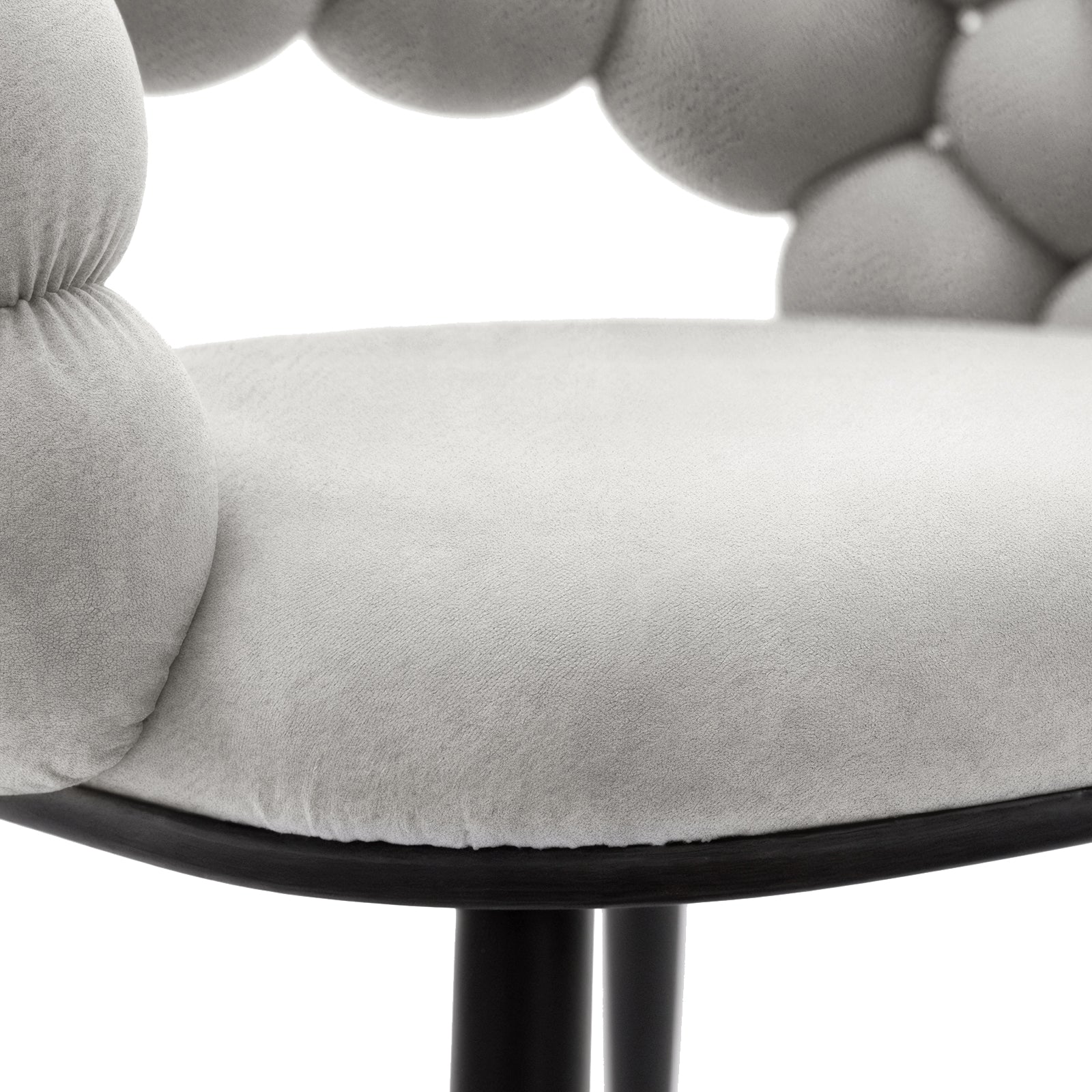 Claudine Velvet Curved Dining Chair Set of 2 in Warm Grey features a smooth light-grey cushion on a dark base, with a unique curved Hairball backrest composed of soft, pillow-like segments.