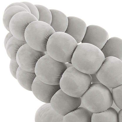 Claudine Velvet Curved Dining Chair Set of 2 in Warm Grey featuring smooth velvet upholstery, a distinctive curved backrest, and plush cushioning for a stylish and comfortable dining experience.