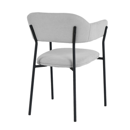 Clavin Fabric Dining Chair Set of 2 in Light Grey, featuring a minimalist design with gently curved, padded backrests and seats, upholstered in light gray fabric, supported by slim, black metal legs.