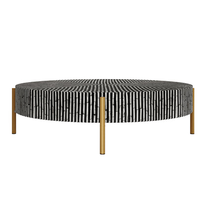 Cradily Mother of Pearl Inlay Coffee Table in Ivory & Black, featuring a round tabletop with intricate black-and-white striped inlay, supported by slender gold-finished legs, offering an elegant, modern design.